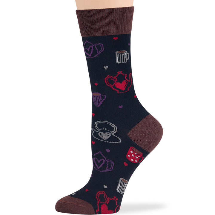 Women’s novelty crew socks featuring coffee and tea patterns in dark colors, designed for comfort and style.