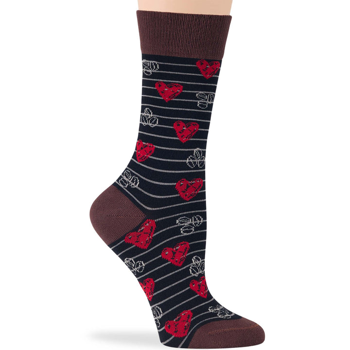 Women’s bamboo crew socks with heart pattern on a black background, featuring a brown cuff, perfect for coffee and tea lovers.