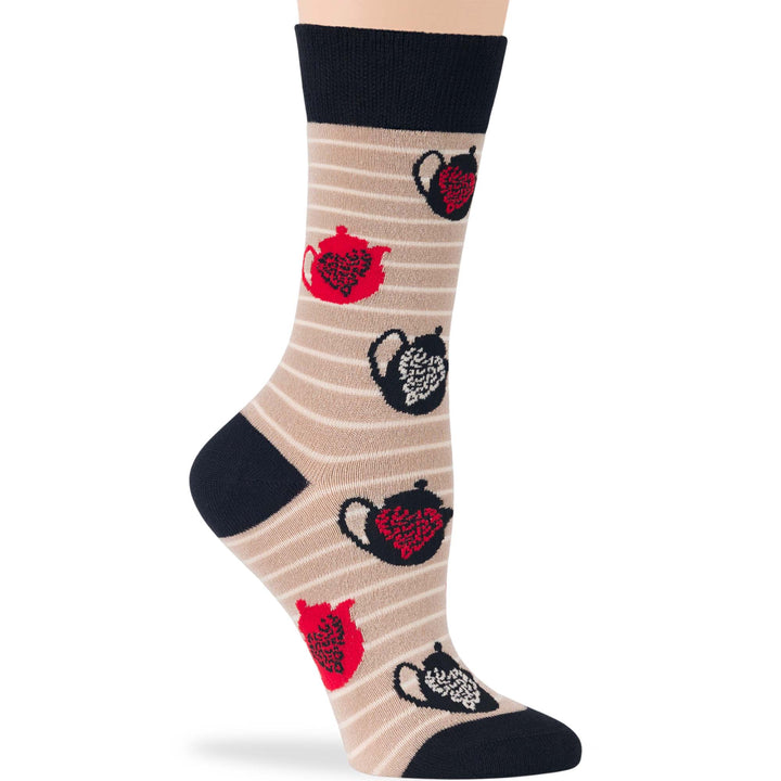 Crew socks featuring tea pot pattern in red and black on a striped beige background, perfect for coffee and tea lovers.