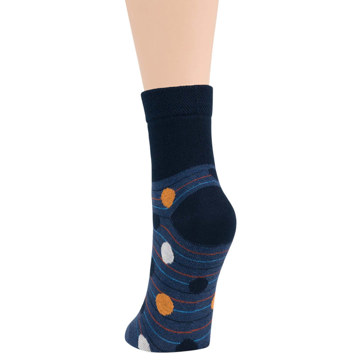 Women's dark navy polka dot diabetic quarter sock with seamless, non-binding, breathable fabric for neuropathy and ultimate comfort.